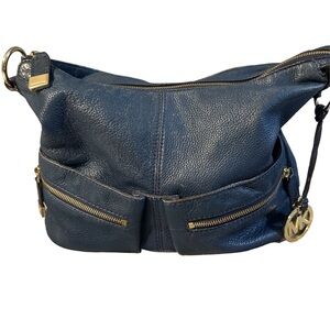 Micheal kors navy blue pebbled leather handbag with gold hardware nice size